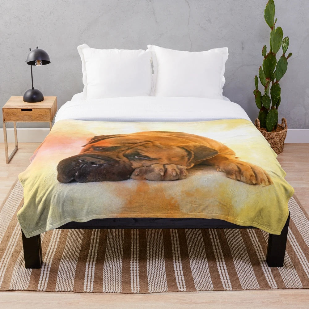 Bullmastiff dog portrait on a plush blanket