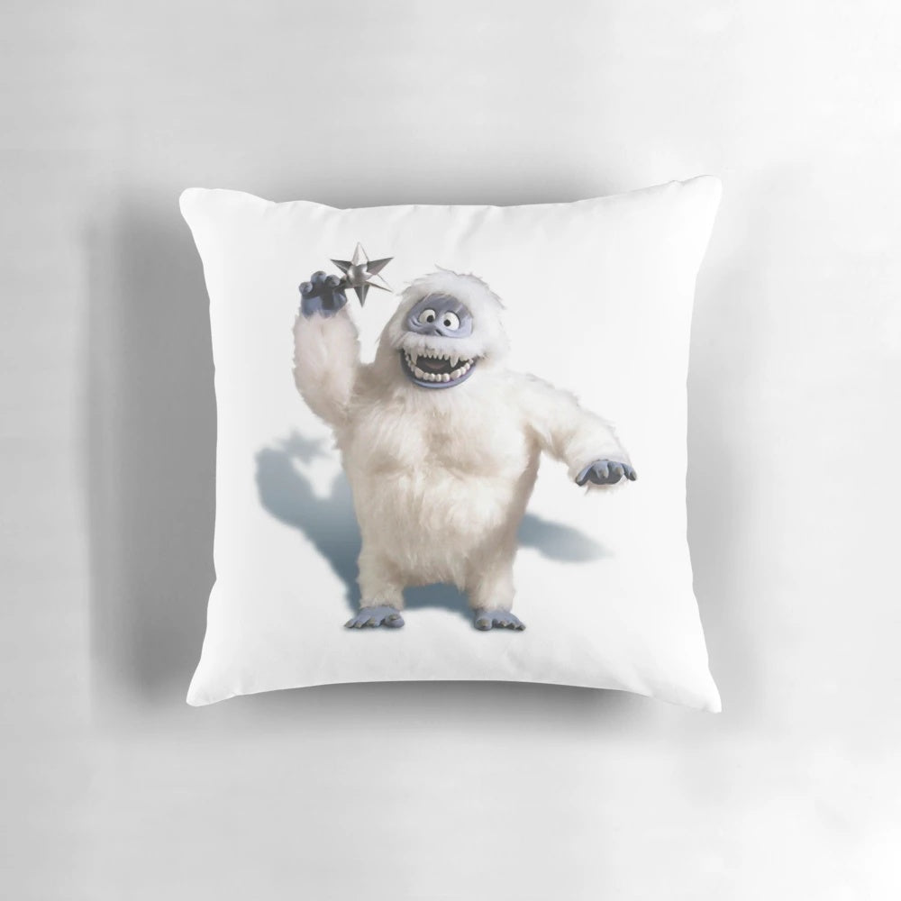Soft, plush Bumble the Abominable Snowman pillow with a snowy winter scene, perfect for Christmas and holiday home decor.