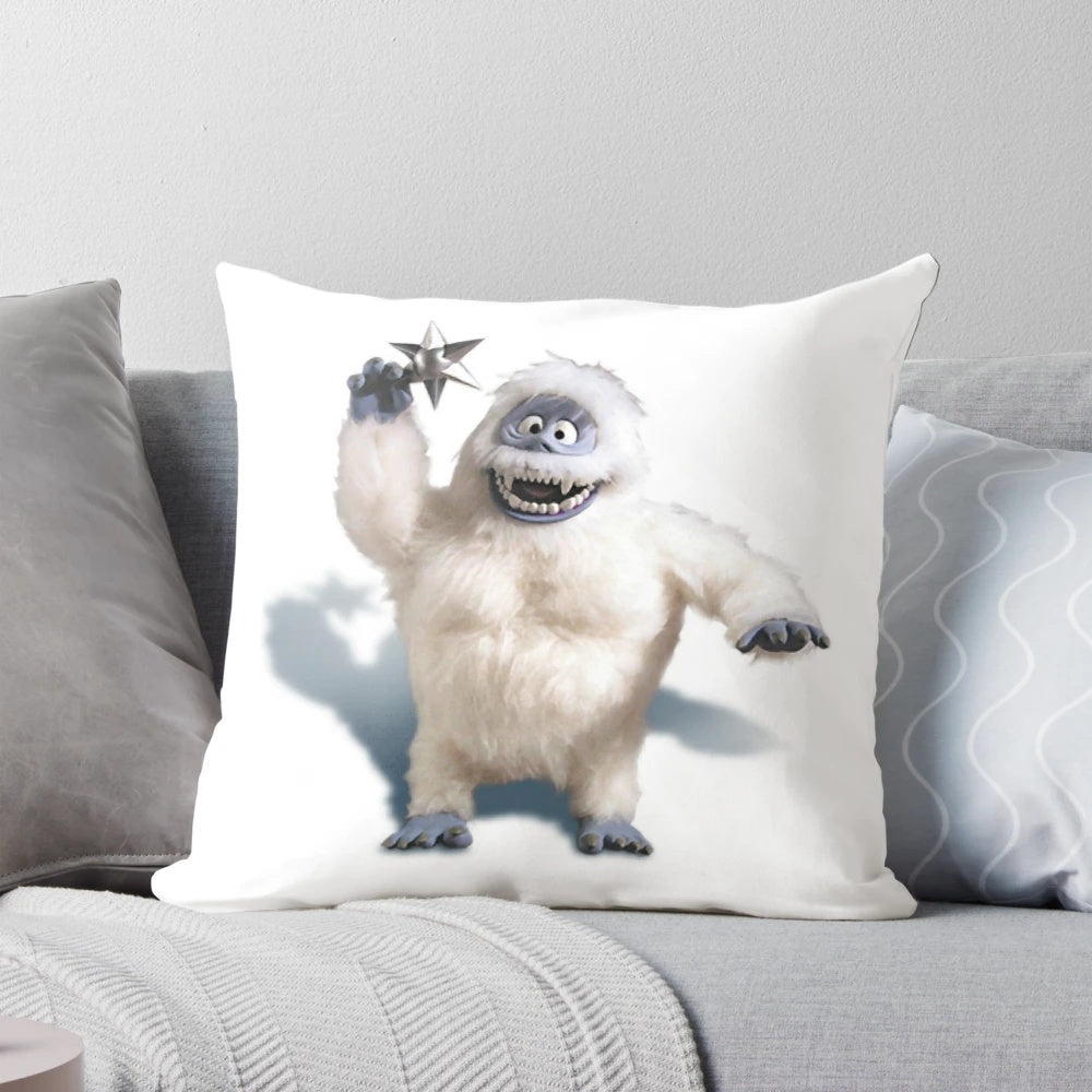 Soft, plush Bumble the Abominable Snowman pillow with a snowy winter scene, perfect for Christmas and holiday home decor.