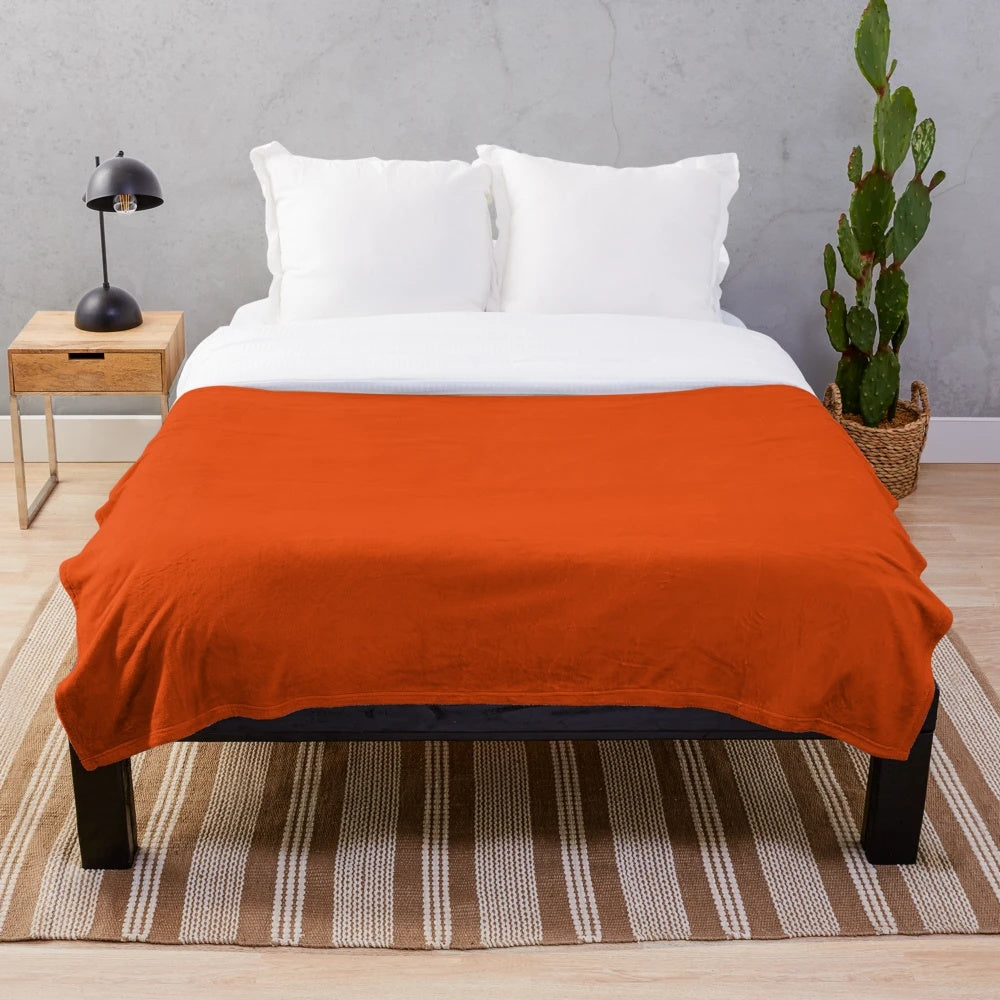 Burnt orange plush blanket for cozy autumn home decor