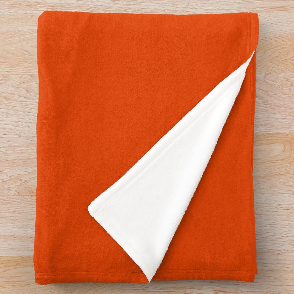 Burnt orange plush blanket for cozy autumn home decor