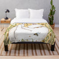 Cozy plush blanket featuring butterflies and bees