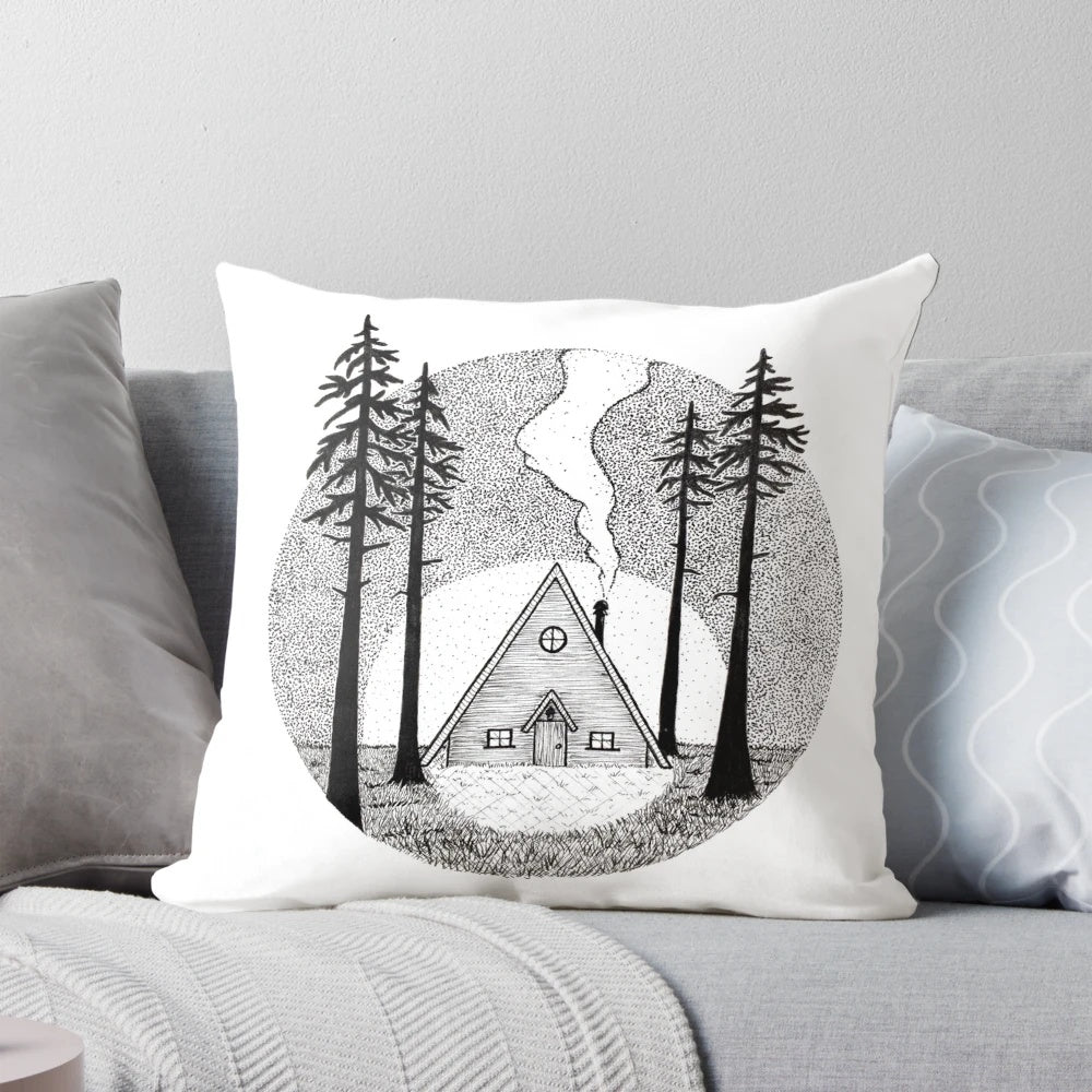 Cozy black and white pen and ink illustration of a cabin in the woods on a Build Pillow by artist Robin Hogan