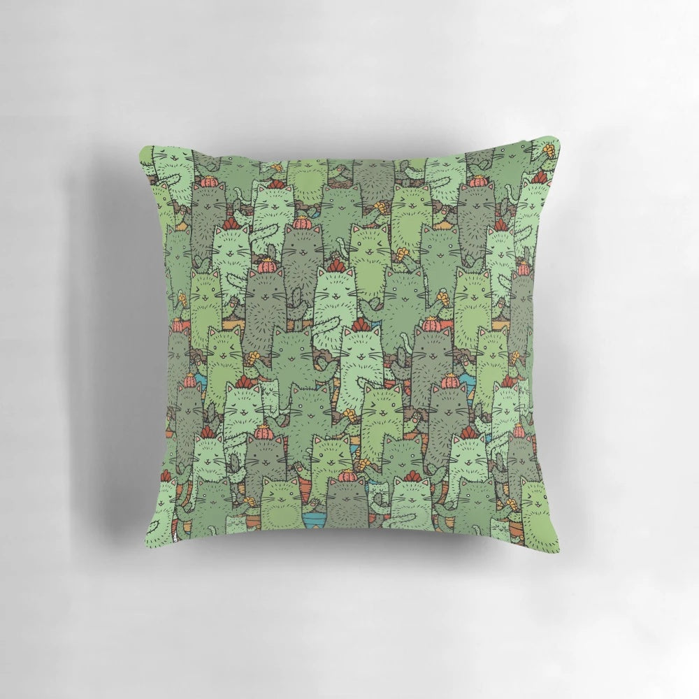 Decorative throw pillow featuring a whimsical cactus garden design, perfect for cat lovers and nature enthusiasts.