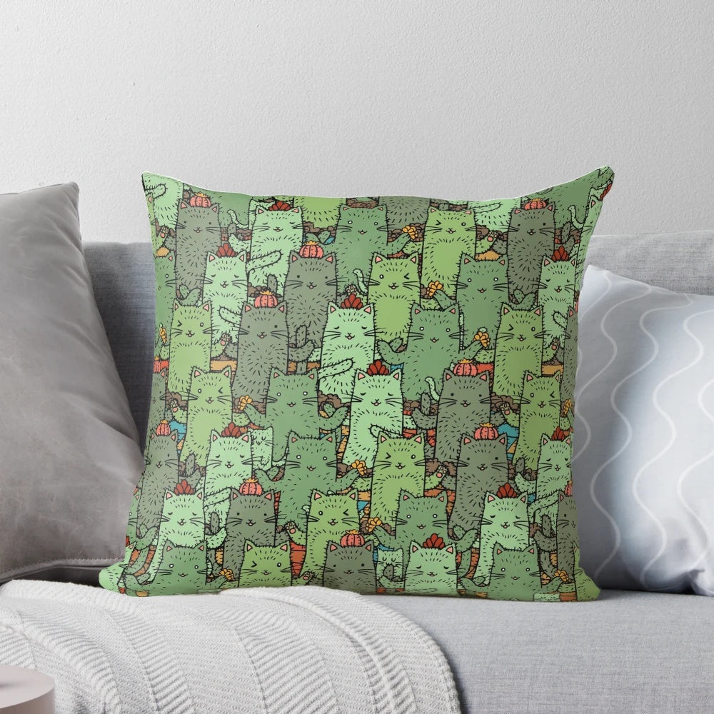 Decorative throw pillow featuring a whimsical cactus garden design, perfect for cat lovers and nature enthusiasts.