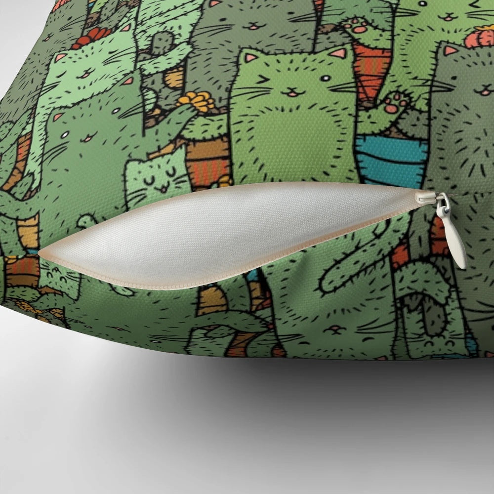Decorative throw pillow featuring a whimsical cactus garden design, perfect for cat lovers and nature enthusiasts.