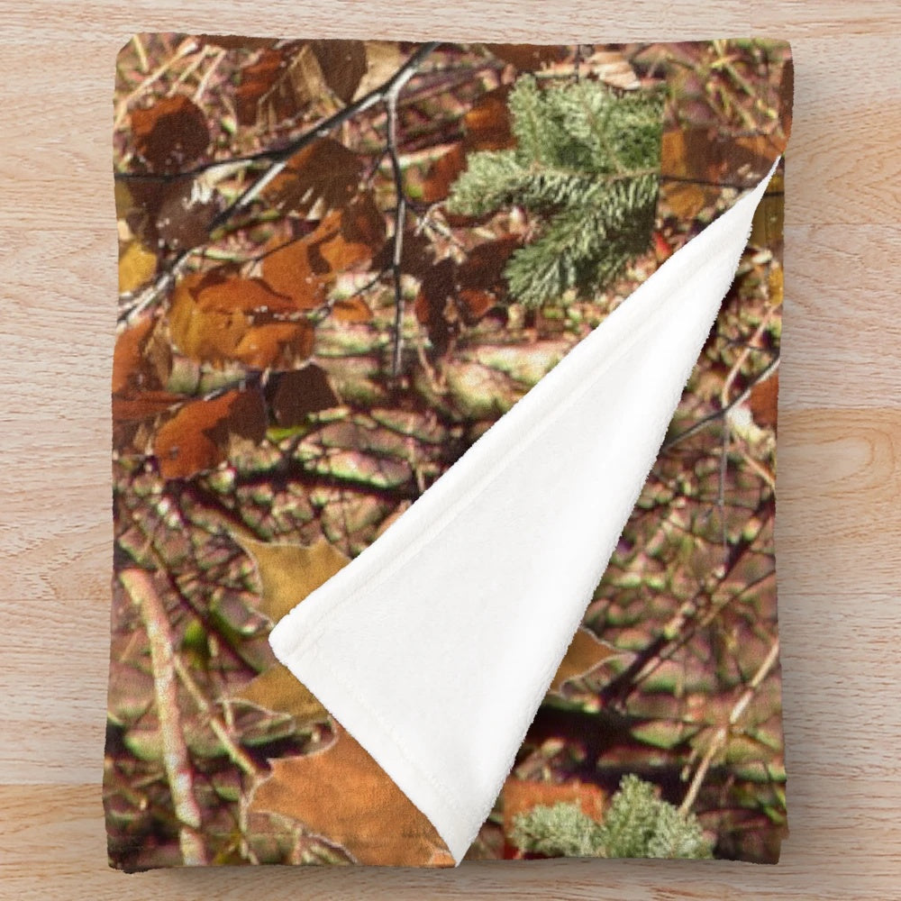 Detailed image of a high-resolution, sharp, fall-themed camouflage plush blanket