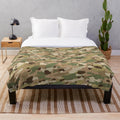 Plush camouflage blanket with military-style pattern