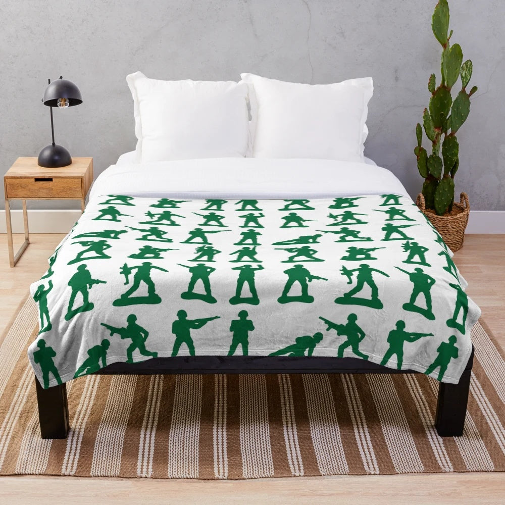 Plush blanket with graphic design of army soldier silhouette