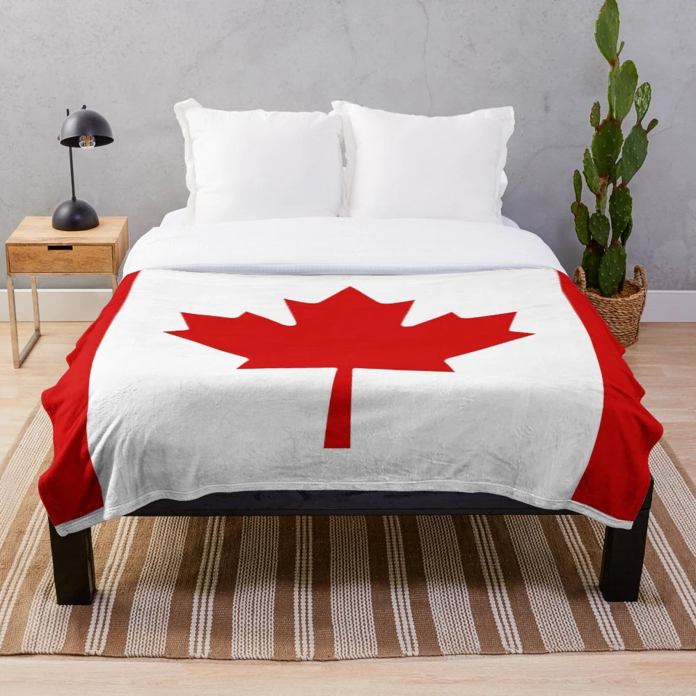 Canada flag plush blanket with maple leaf design