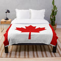 Canada flag plush blanket with maple leaf design
