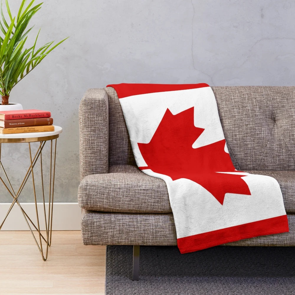 Canada flag plush blanket with maple leaf design