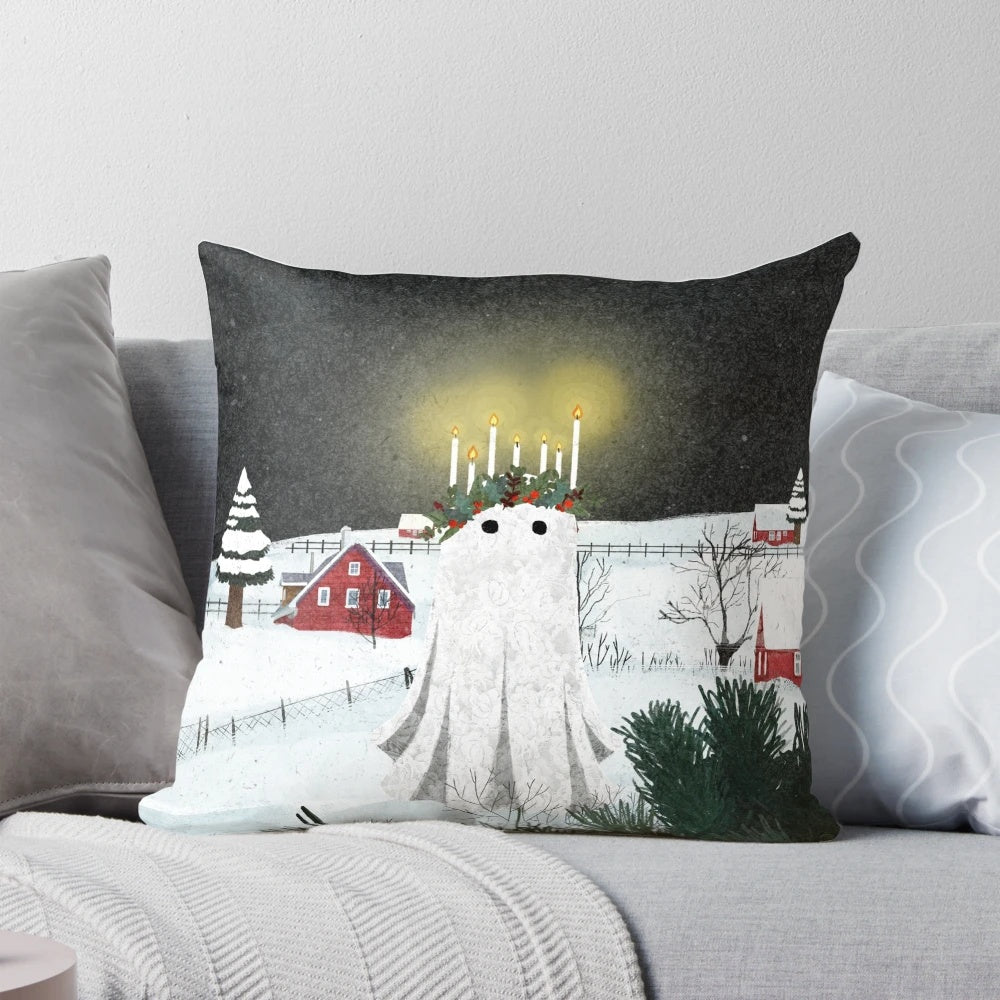 A fluffy white pillow with a charming candlelight design, perfect for a cozy winter home.
