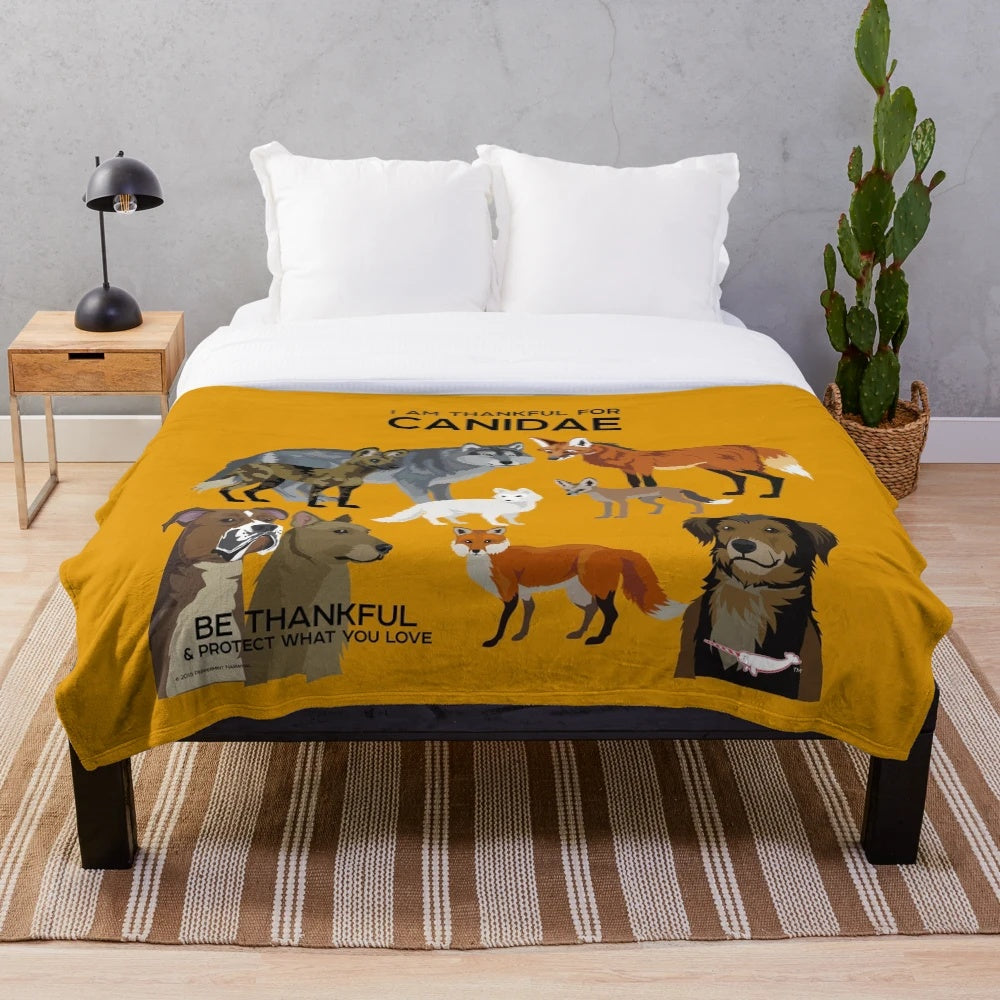 Soft and comfy plush blanket featuring a Canidae-inspired design, perfect for animal lovers