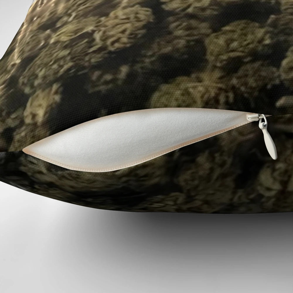 A plush, zippered pillow featuring a stylized cannabis leaf design