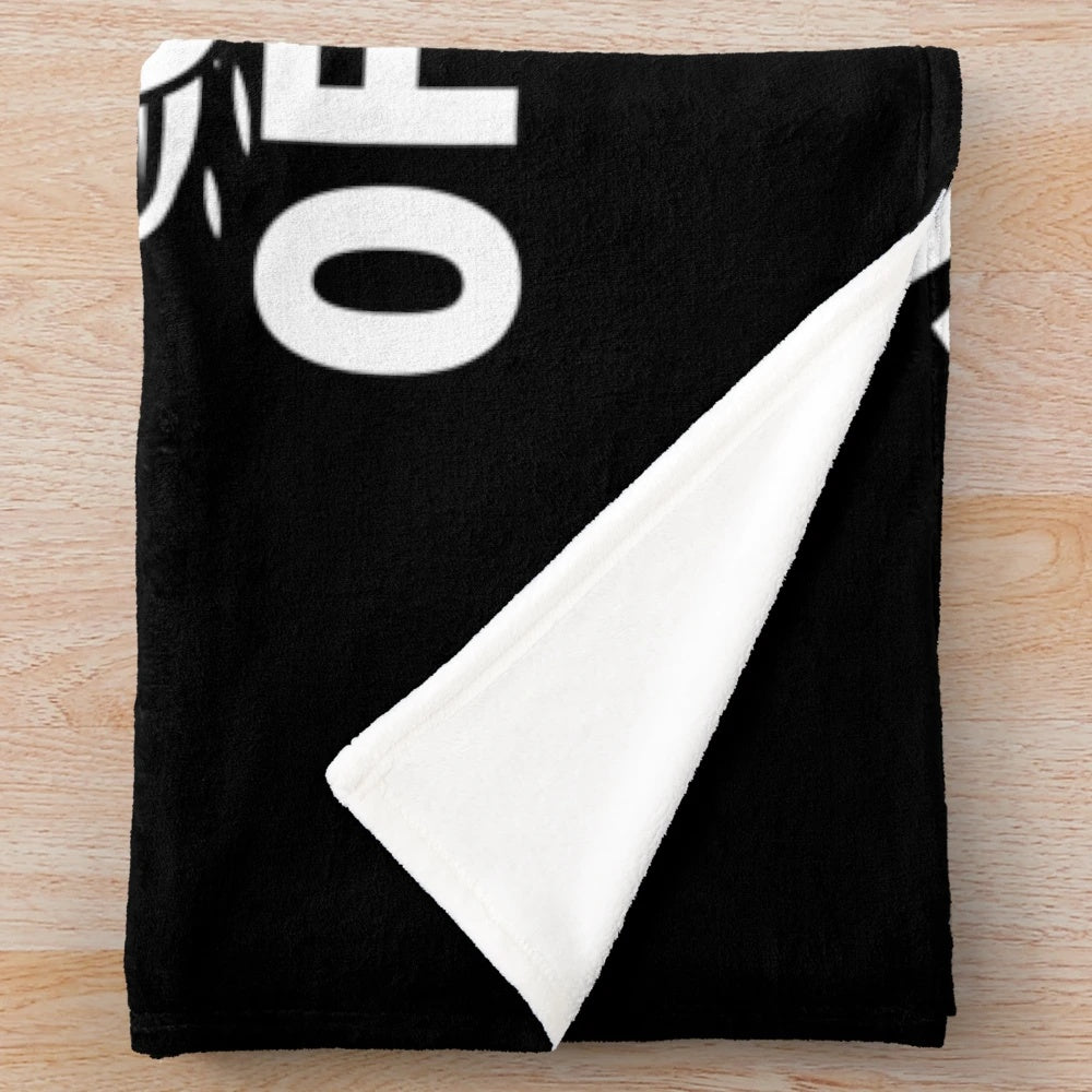 Plush blanket featuring a canoeing design