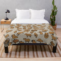 Cozy capybara plush blanket featuring a cute, repeating pattern of the lovable South American rodent