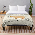 Soft and cuddly plush blanket featuring a detailed capybara design