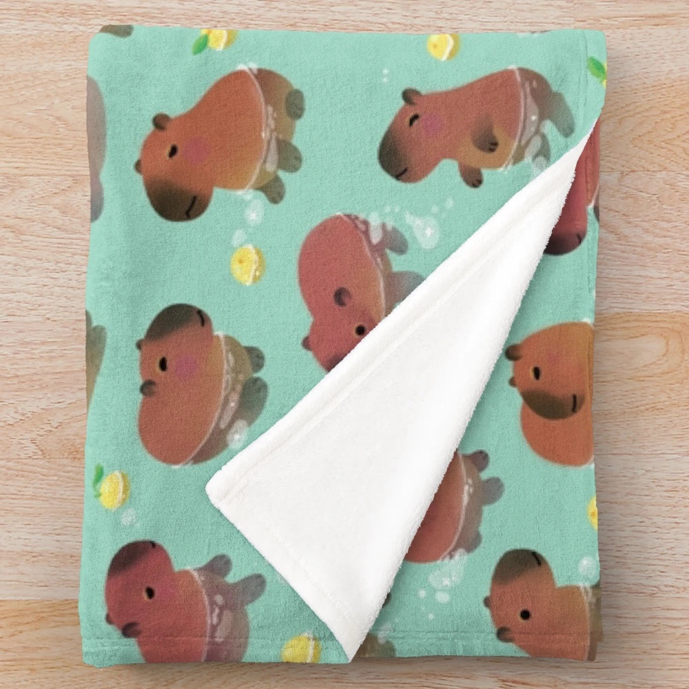 Soft and cuddly capybara plush blanket for cozy winter days