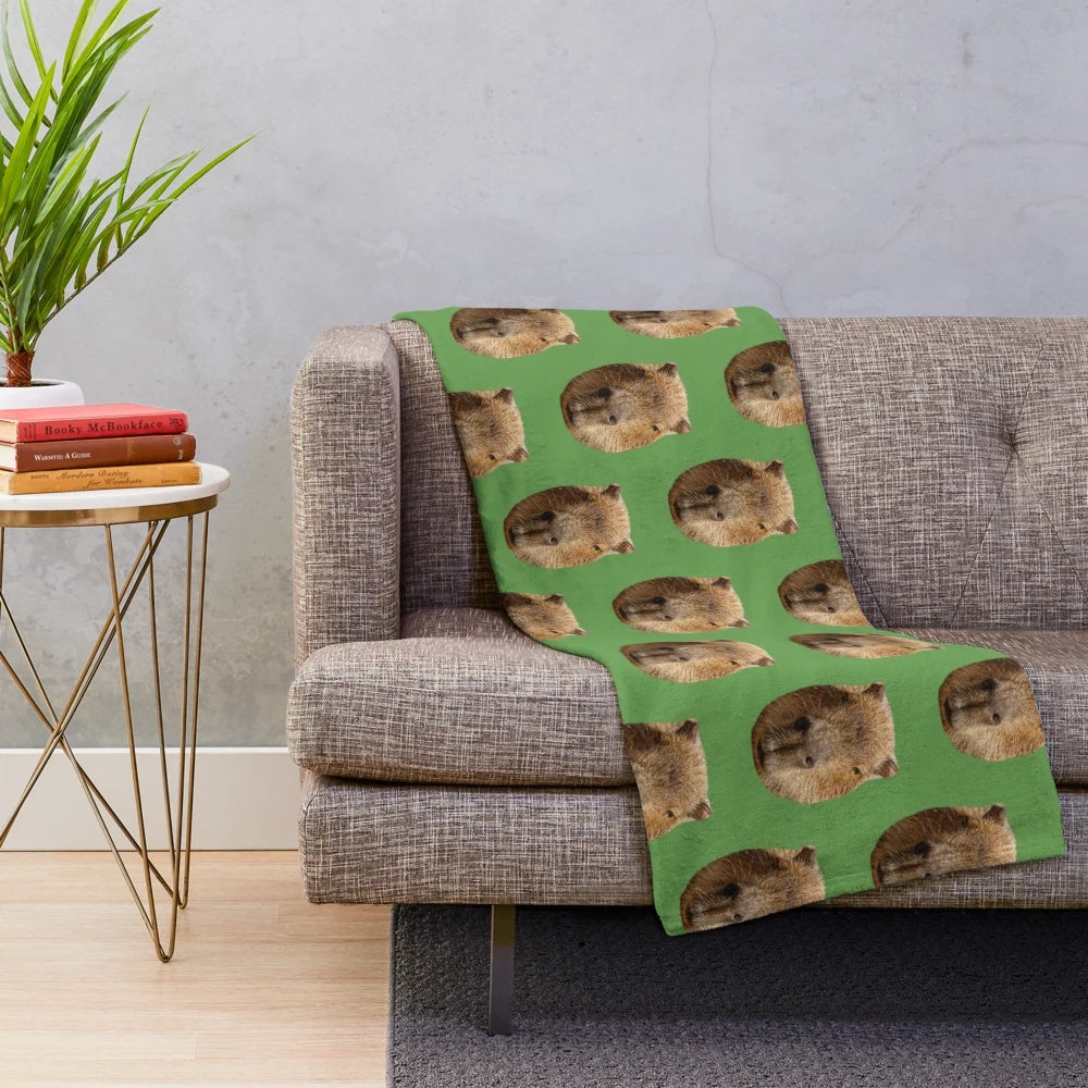Capybara plush blanket featuring the adorable face of the semi-aquatic rodent