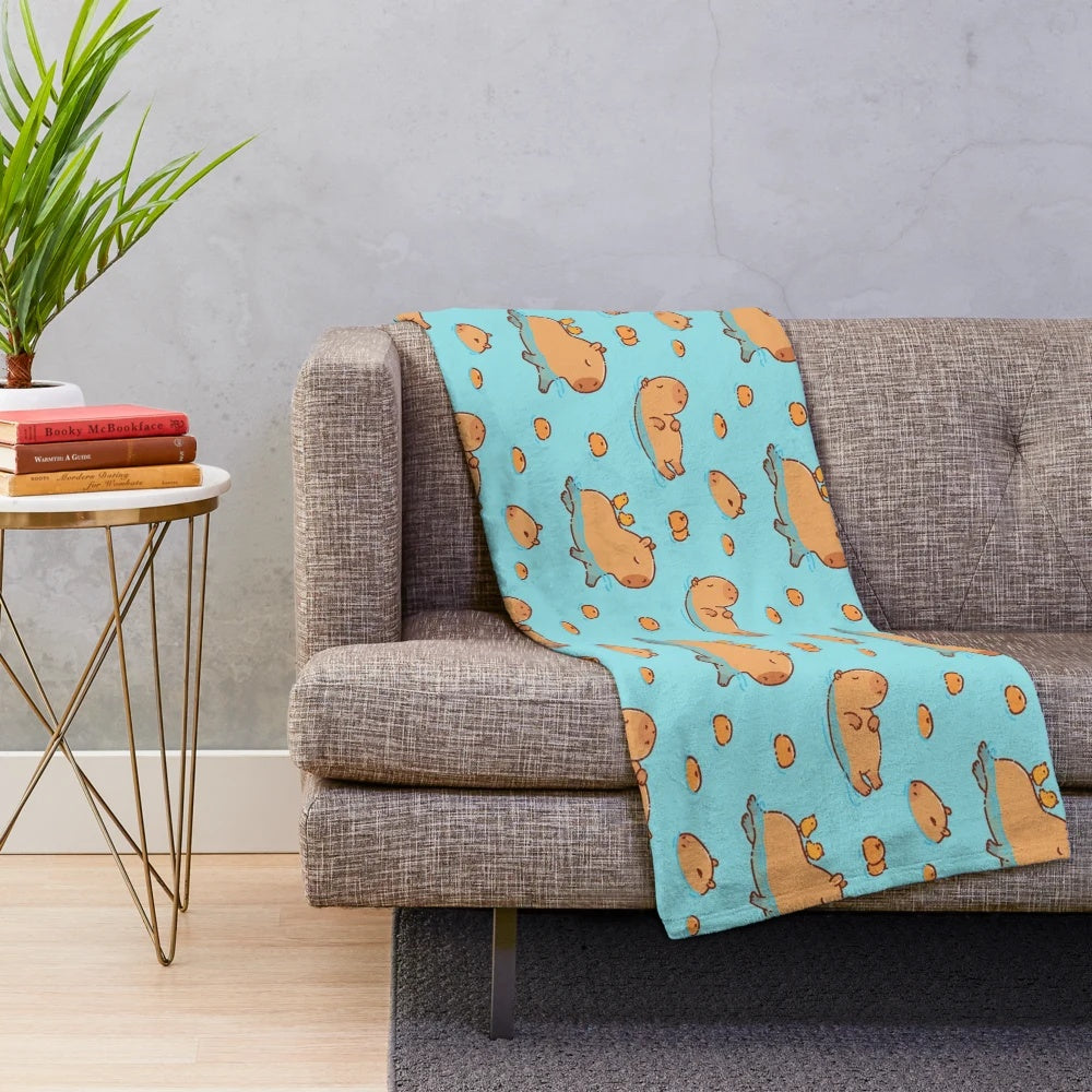 Capybara pattern swimming with oranges plush blanket