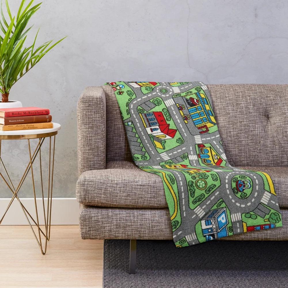 Plush car-themed blanket with road design for children's play and comfort