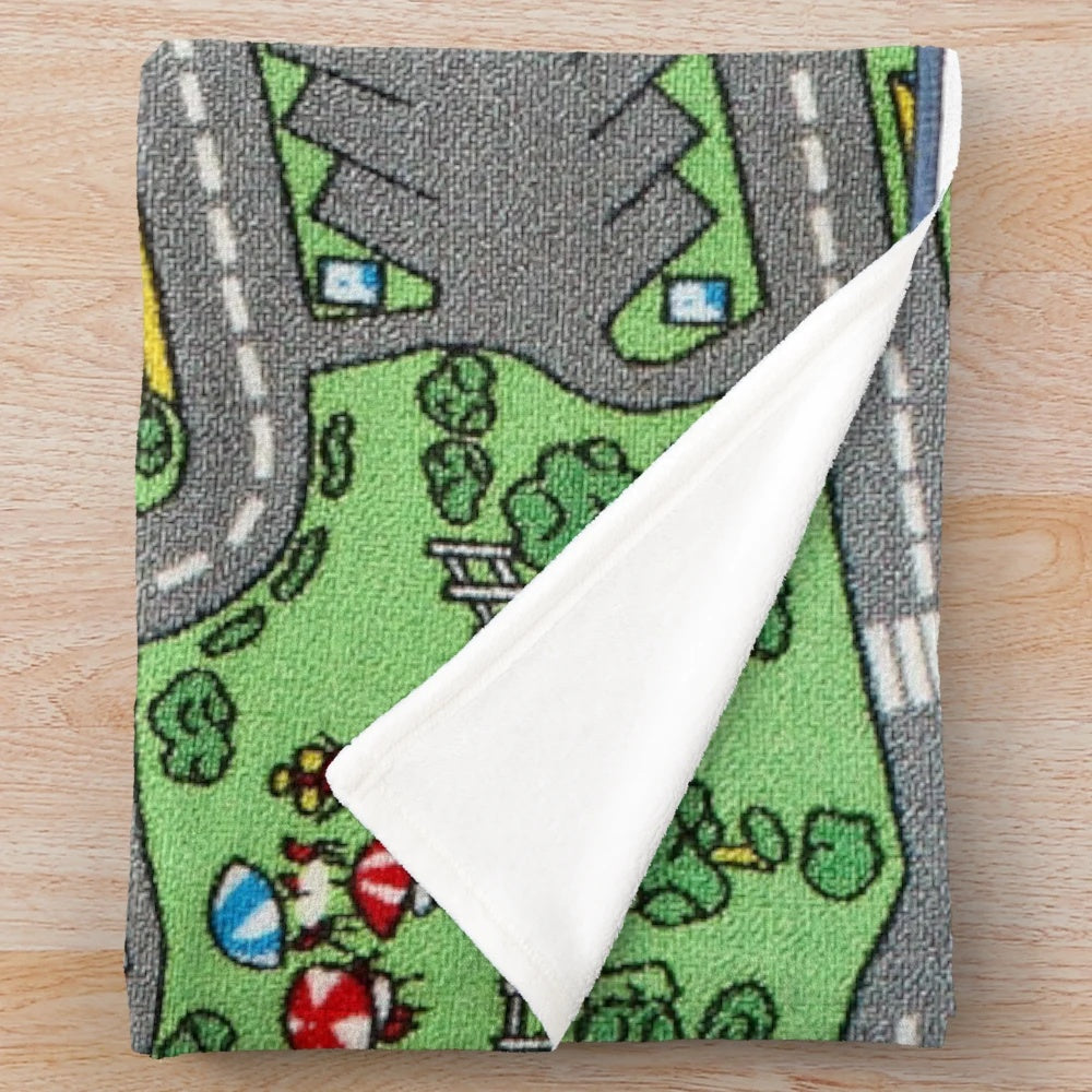 Plush car-themed blanket with road design for children's play and comfort