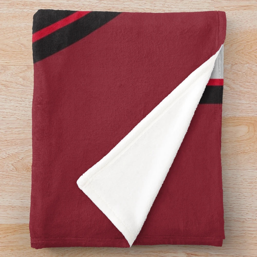 Carnegie Mellon Tartans plush blanket featuring the university's iconic tartan pattern