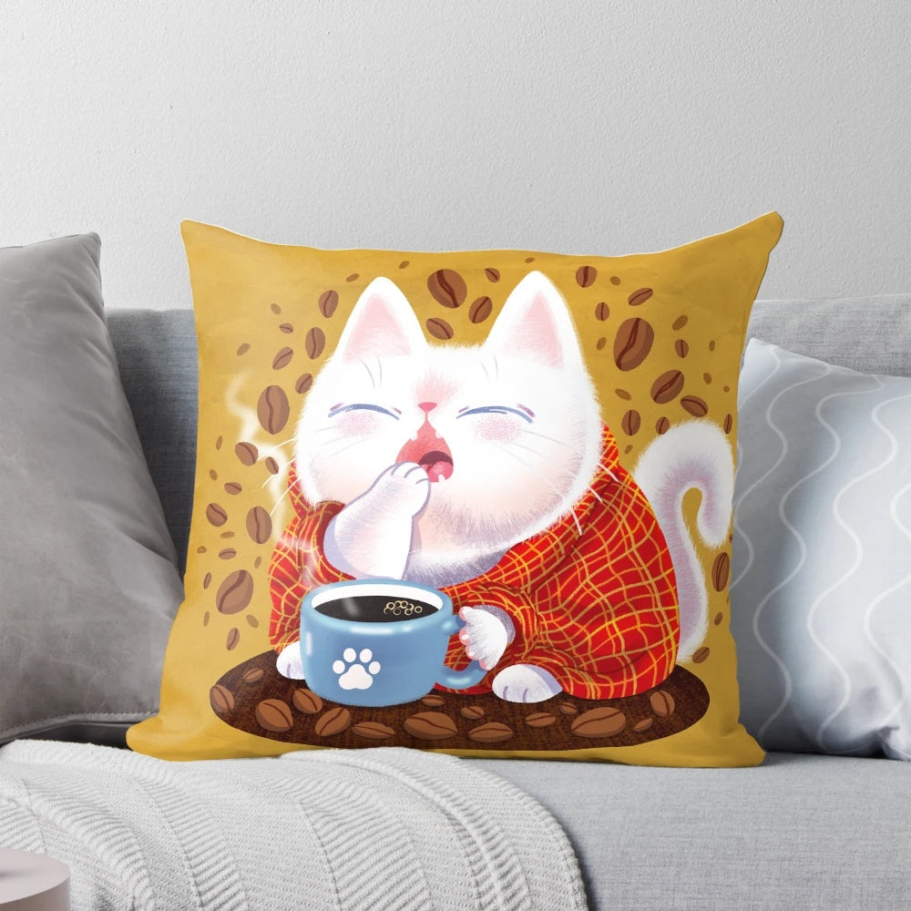 A dreamy white cat curled up on a pillow with a steaming cup of coffee, perfect for cat lovers and home decor.