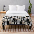 Cozy cat-themed plush blanket featuring cartoon cats in neutral colors
