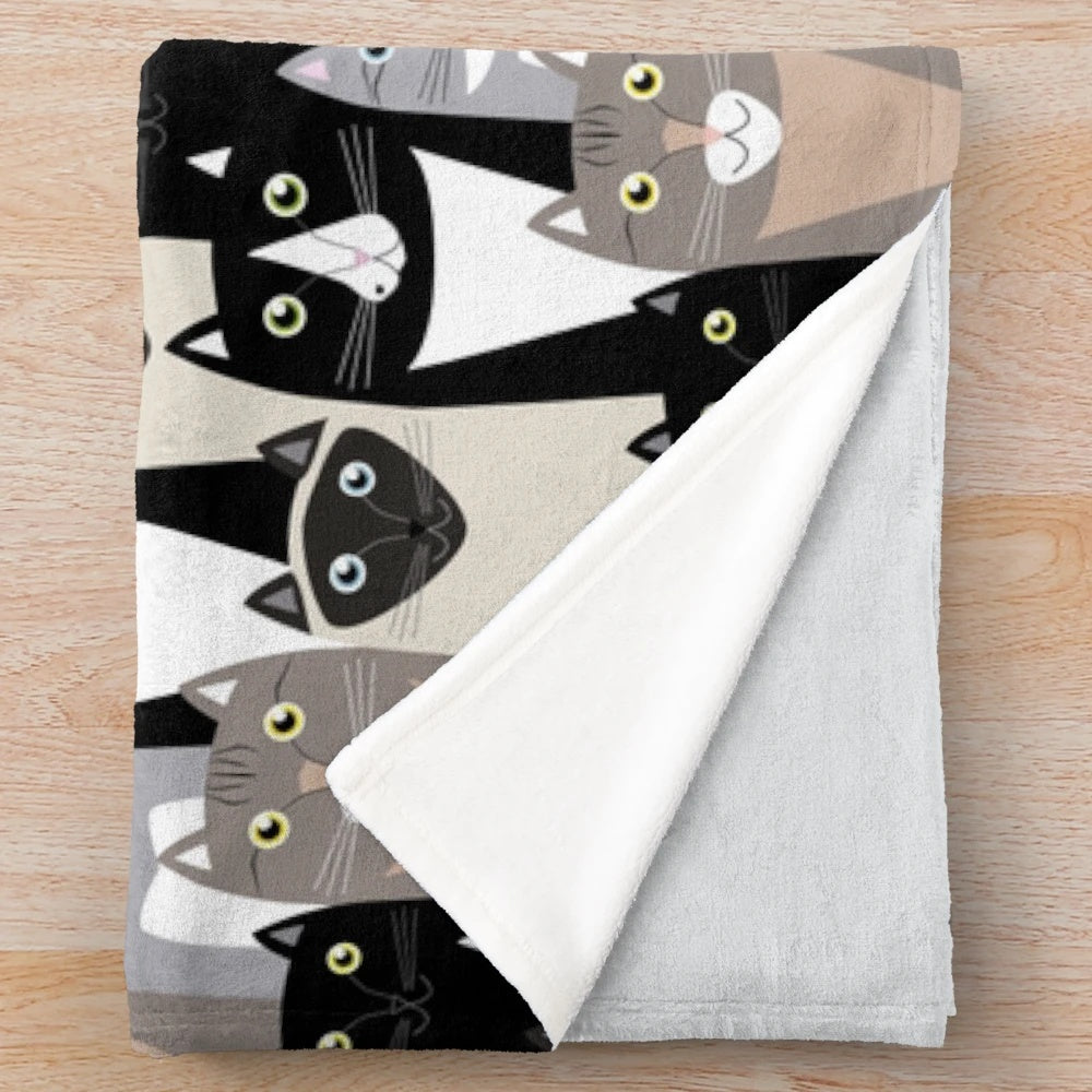 Cozy cat-themed plush blanket featuring cartoon cats in neutral colors