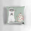 A cozy Siamese cat pillow design featuring a cute cat drinking a hot beverage.
