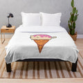 Soft and cuddly plush blanket featuring a cat ice cream design