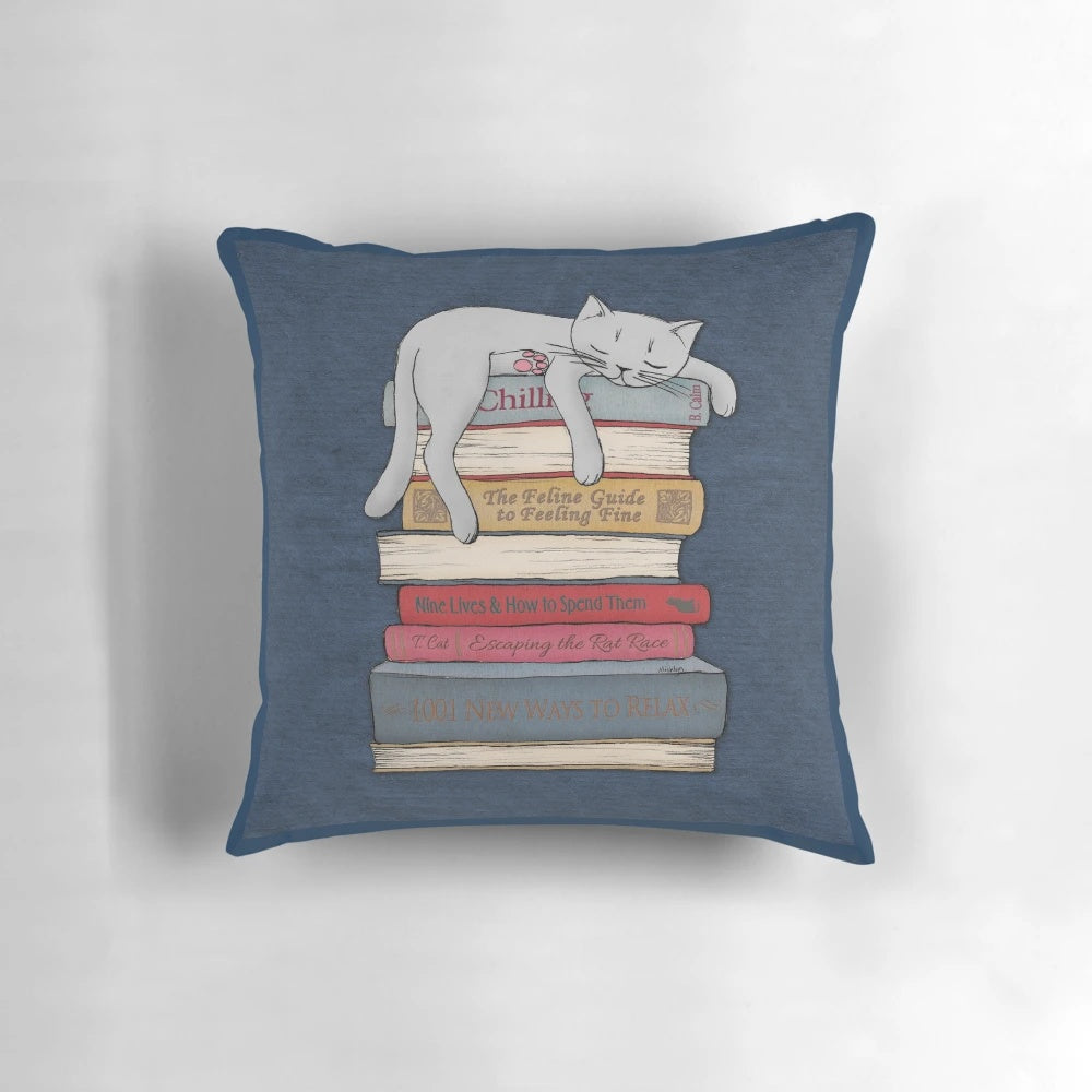 A grey and blue pillow with a graphite pencil design, perfect for cat lovers to relax and nap like their feline friends.