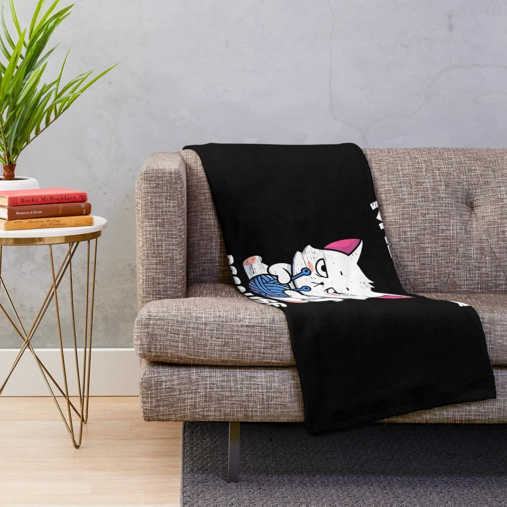 Soft plush blanket with cat-themed knitting design