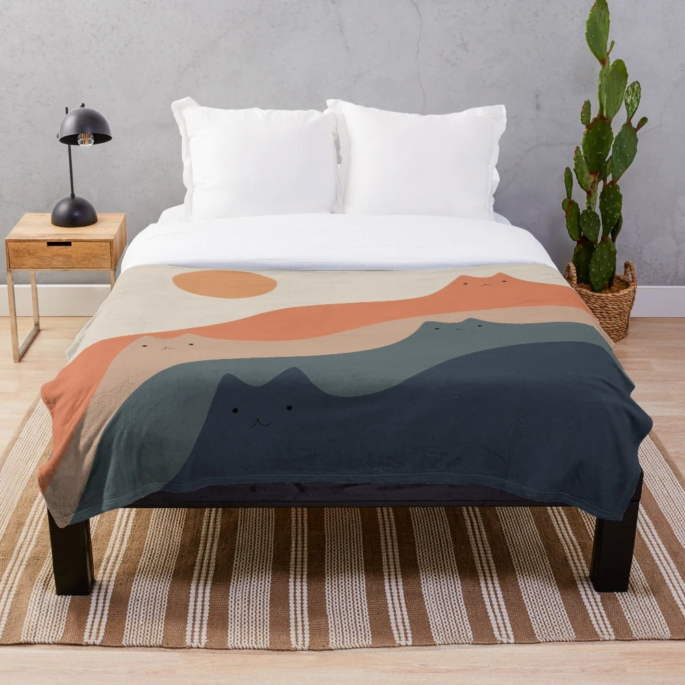 Soft and plush cat landscape blanket with mountains, sun, and boho elements