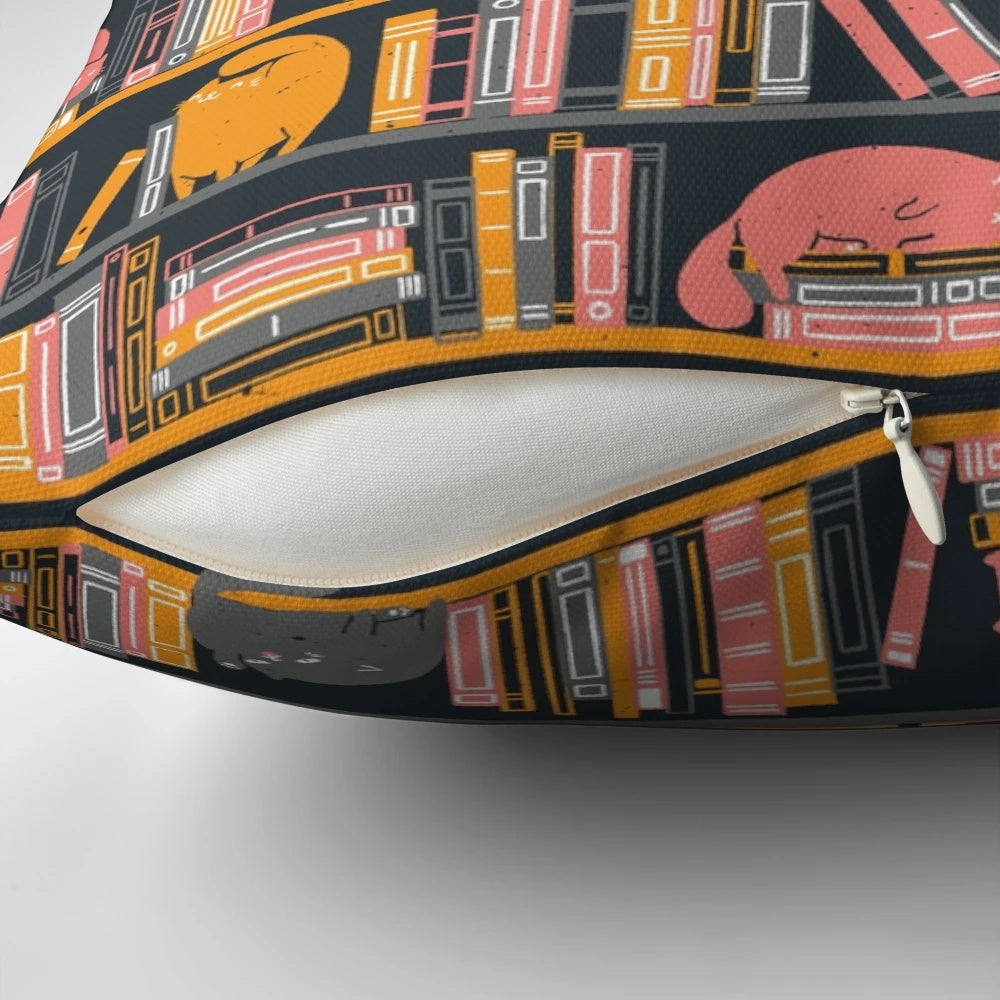 Soft and snuggly cat-themed pillow featuring a cat lounging on a bookshelf