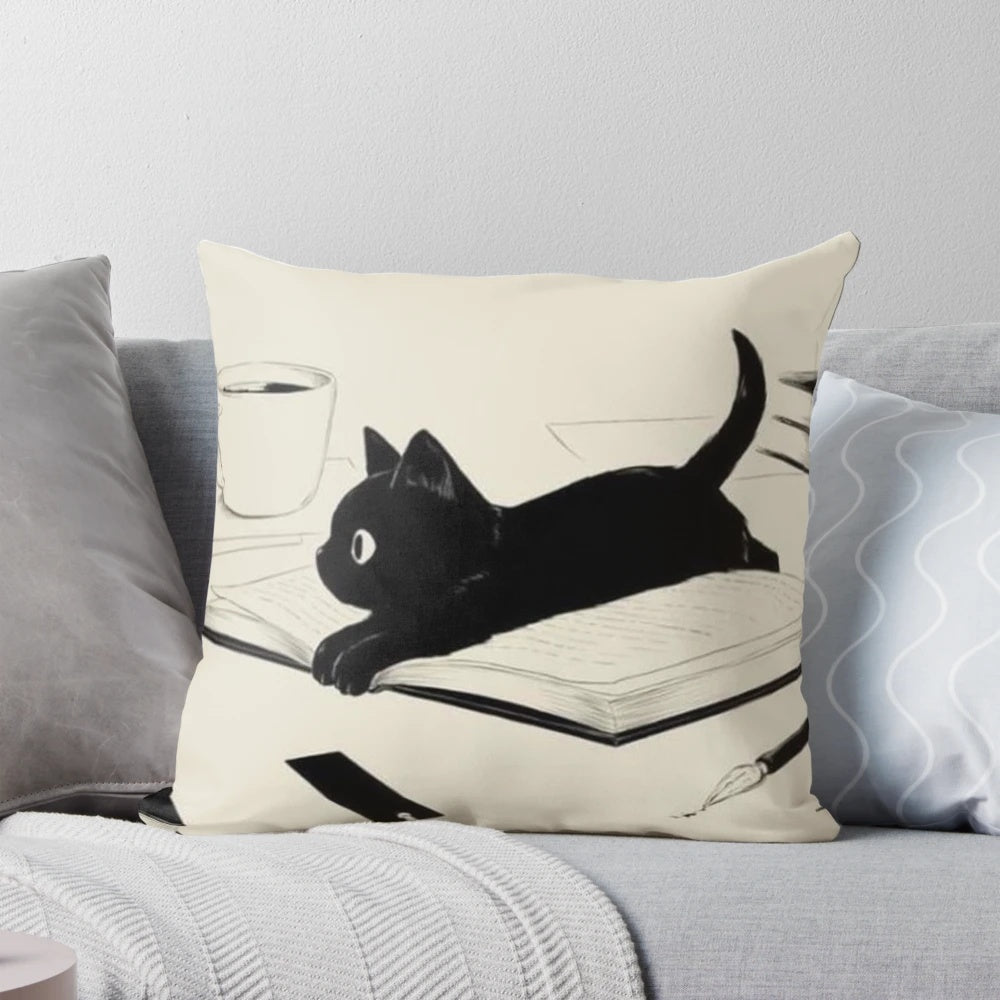 A soft, plush cat-shaped pillow in a black and neutral color scheme, perfect for cat lovers and adding a touch of coziness to any space.