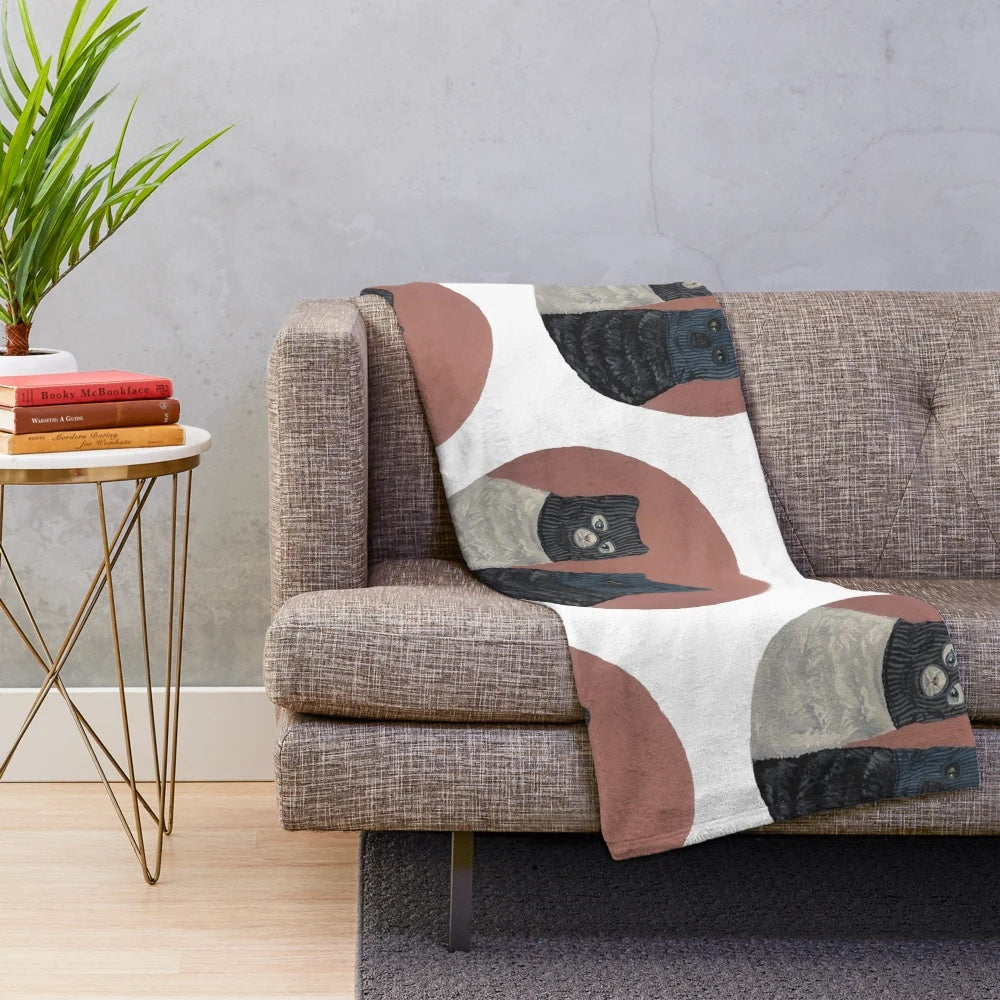 Two cats in balaclavas design on a cozy plush blanket