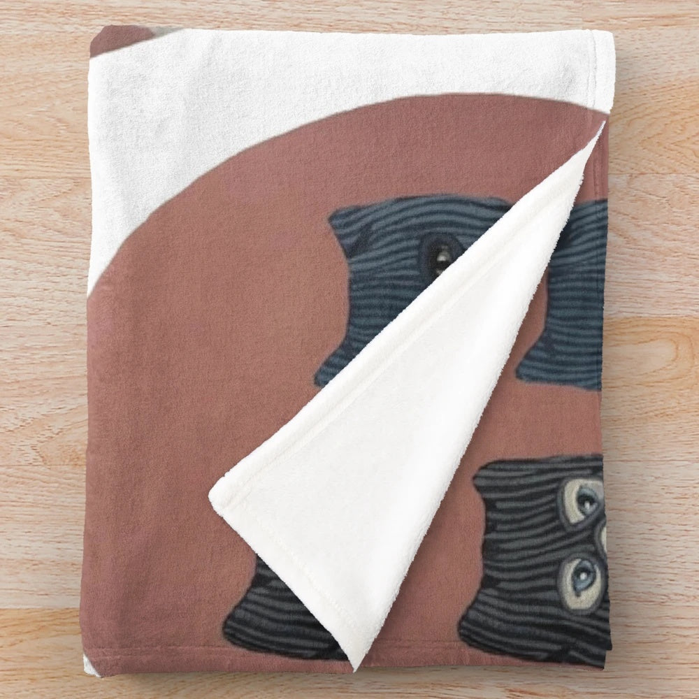 Two cats in balaclavas design on a cozy plush blanket