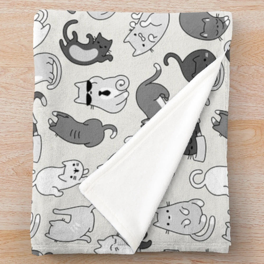 Cute illustrated cat pattern on a cozy plush blanket