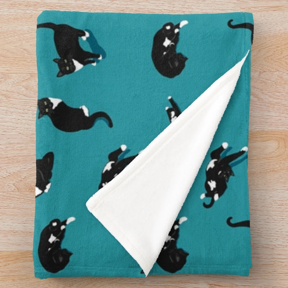 Cozy cat pattern plush blanket with black and white tuxedo cat design