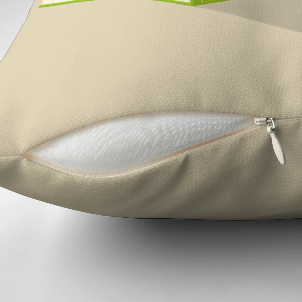 A decorative cat-themed pillow with a whimsical book and literature design.