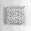 A soft, plush pillow featuring a pattern of adorable cats and felines in various colors and poses.