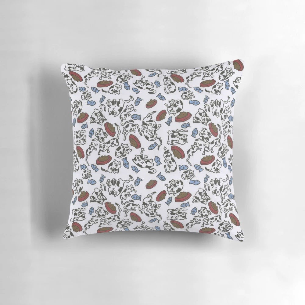 A soft, plush pillow featuring a pattern of adorable cats and felines in various colors and poses.
