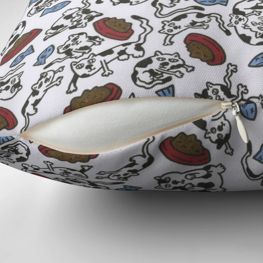 A soft, plush pillow featuring a pattern of adorable cats and felines in various colors and poses.