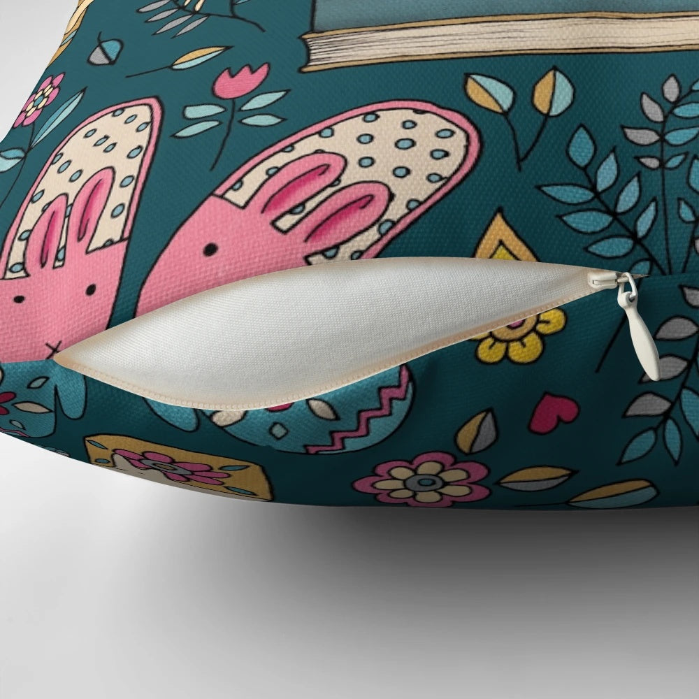 Soft, plush cat-shaped pillow in dark green and pink colors, perfect for a cozy, hygge-inspired winter nap.