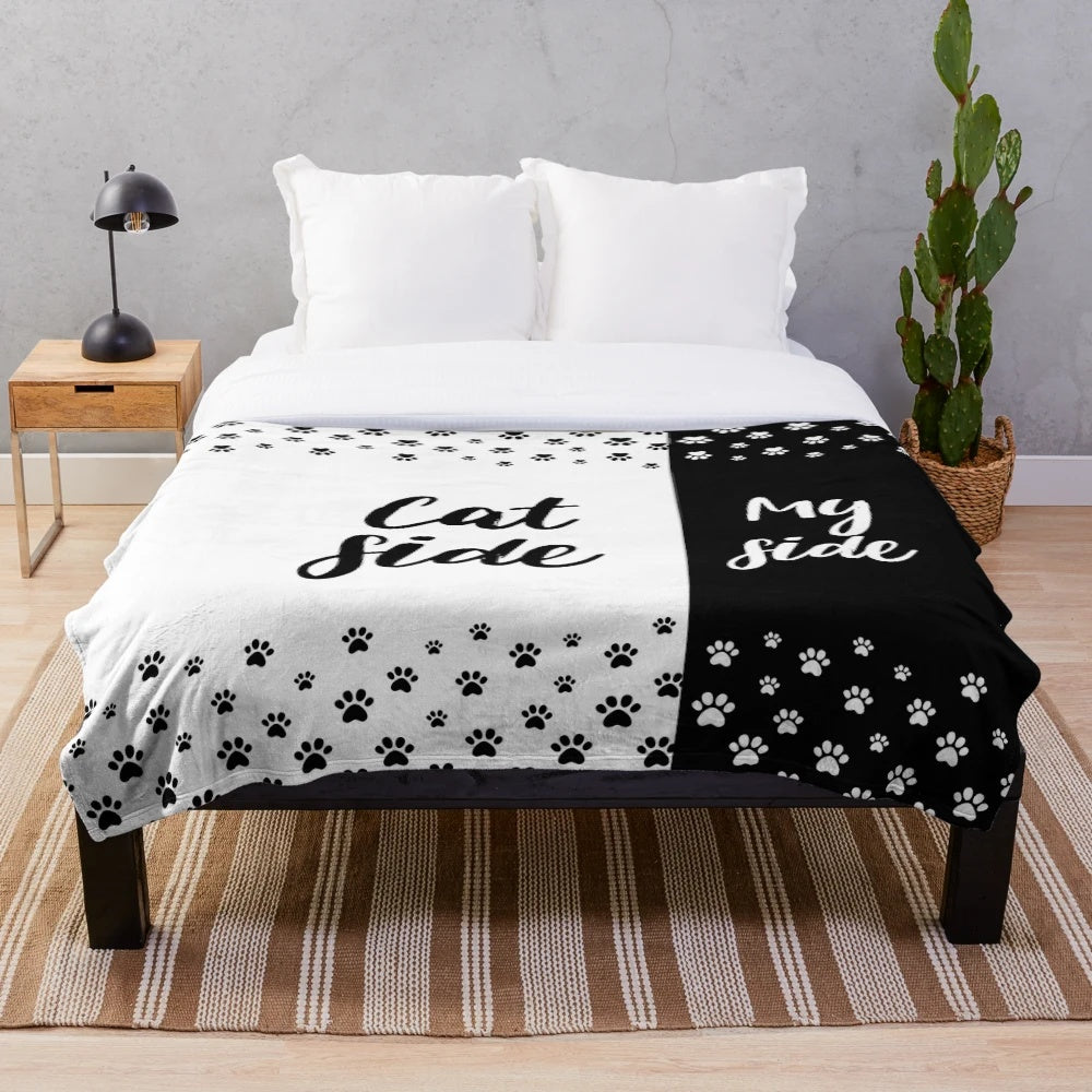 Plush cat-themed blanket with paw prints and funny cat phrase