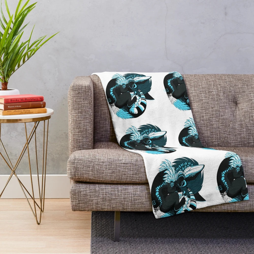 Soft and cuddly plush blanket featuring a cat-inspired sushi design in shades of cyan and turquoise