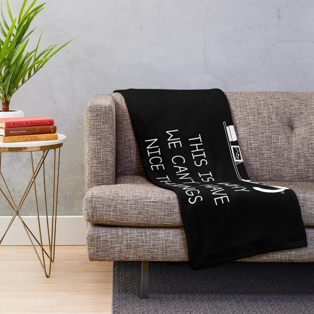 Plush blanket with "This is Why We Can't Have Nice Things" typography and cat-related imagery